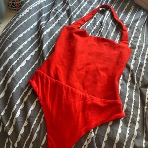 Red halter neck body suit